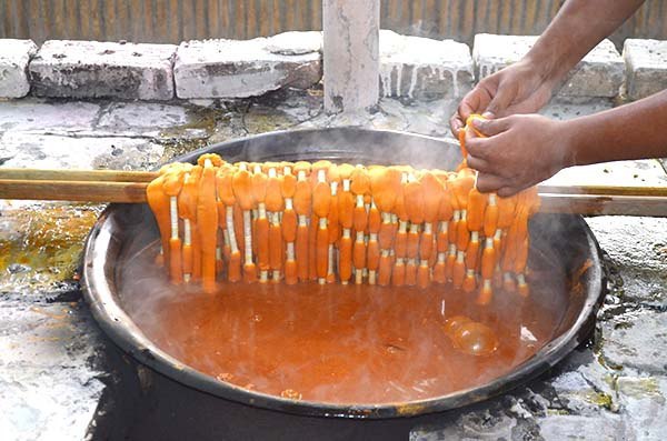 Orange Uzbek ikat dying process