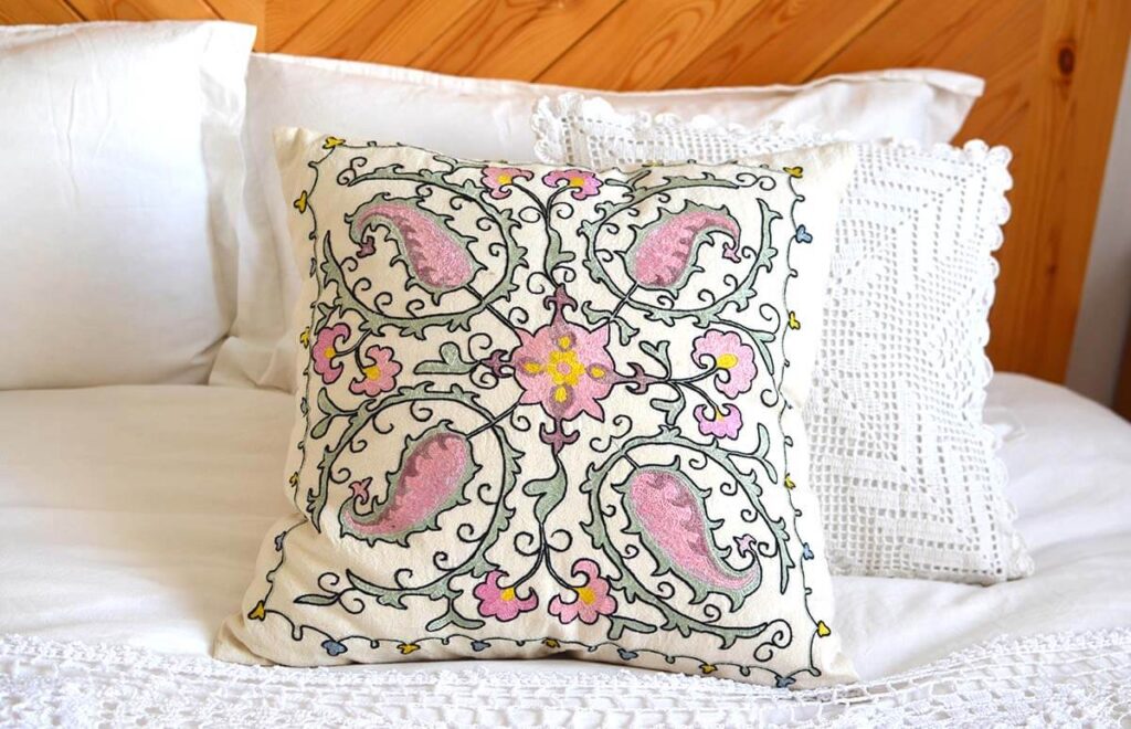 Floral white pink green hand embroidered suzani pillow cover from Uzbekistan