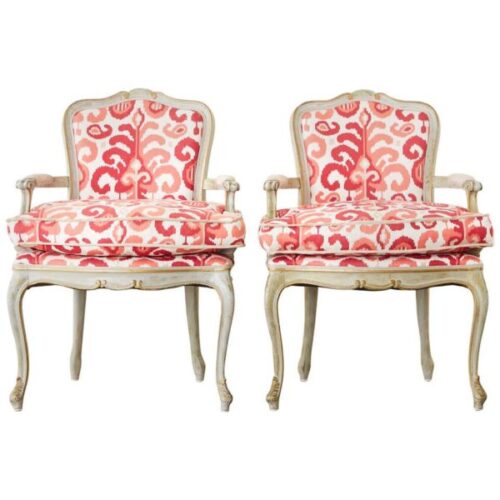 Red coral ikat fabric upholstered antique chairs