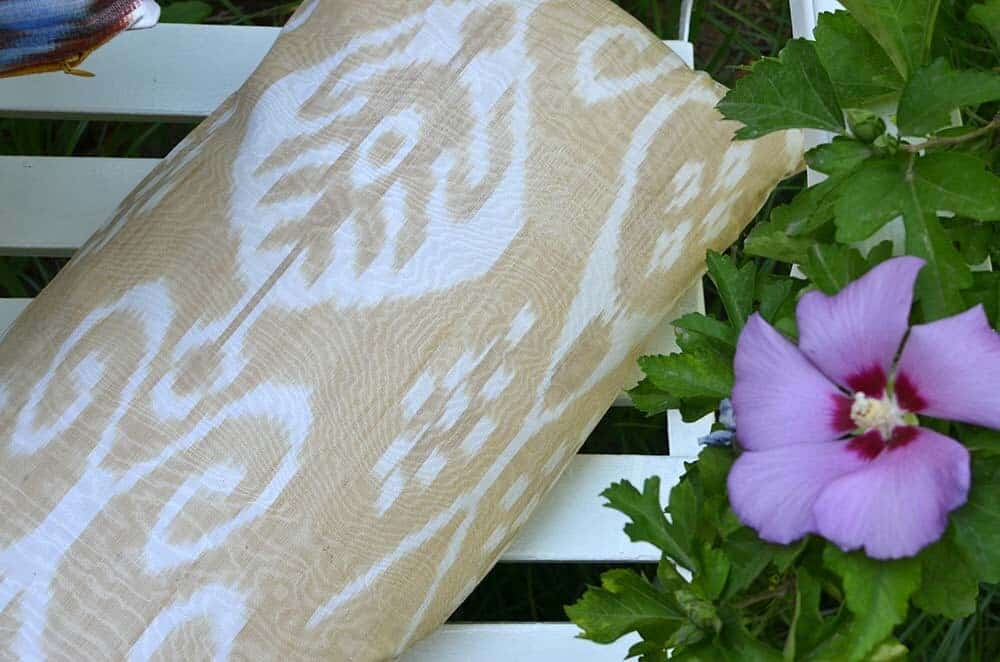 Beige and white lumbar size ikat pillow cover