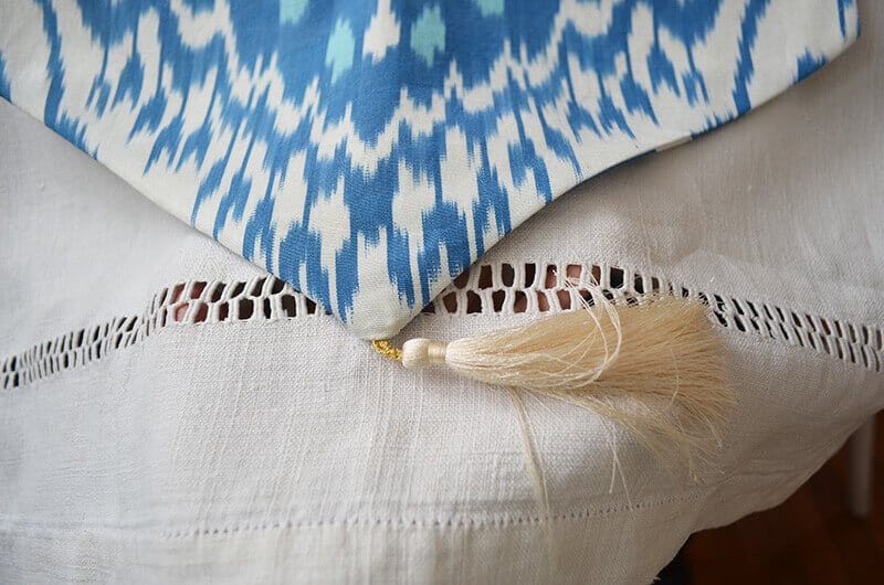 Blue and white u=ikat table runner with tassles